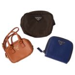 Three Prada coin purses