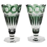 A pair of early 20th c Belgian Val St Lambert emerald green overlaid cut glass trumpet shaped vases