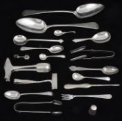 A collection of George III and later silver flatware to include a Georg Jensen salt spoon