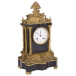 A mid 19th century French ormolu and black slate mantle clock