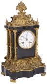 A mid 19th century French ormolu and black slate mantle clock