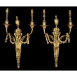 A pair of French Louis XVI style twin branch wall appliques