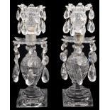 A pair of George III cut glass table lustre candlesticks c.1800