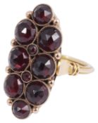 A gold garnet cluster finger ring