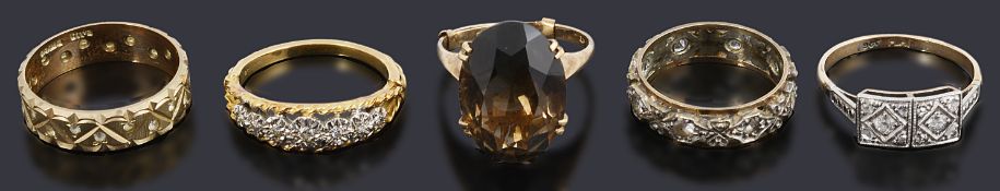 Five assorted gold gem set rings