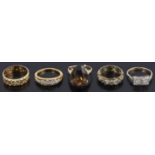 Five assorted gold gem set rings