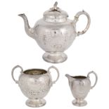 A Victorian matched silver three piece tea service