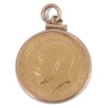 A George V half sovereign dated 1912 channel set in pendant mount
