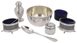 A mixed lot of early 20th century silver to include a christening bowl and a pair of salts