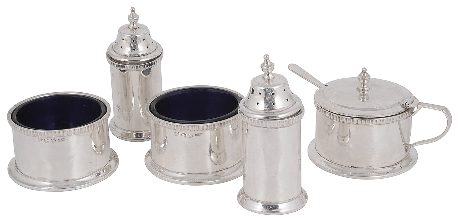 A mid 20th century Indian colonial silver five piece cruet set