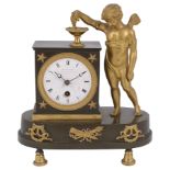 A Regency ormolu and patinated bronze figural mantel timepiece