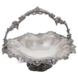 A large early Victorian silver swing handled fruit or cake basket
