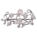 A single pearl and diamond floral spray brooch