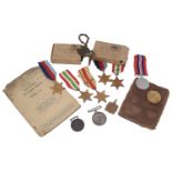 A collection of WWI and WWII medal groups and related items