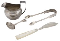 A George III silver cream jug and other items of silver