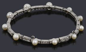 A pearl and diamond bracelet