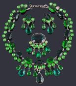 A delightful green stone paste suite