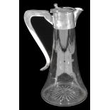 A George V silver mounted clear glass claret jug