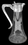 A George V silver mounted clear glass claret jug