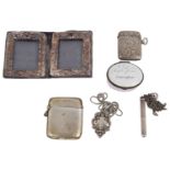 A collection of silver items to inlcude vesta cases