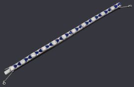 A diamond and sapphire line bracelet