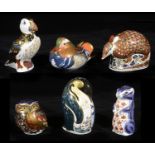 A collection of Royal and Crown Derby animal paperweights