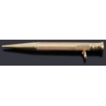 A 9ct gold propelling pencil, with engine turned decoration and a plain polished nib