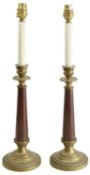 A pair of late 19th century brass and red marble table lamp stands