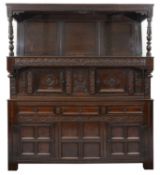A late 17th century panelled oak press cupboard or tridarn
