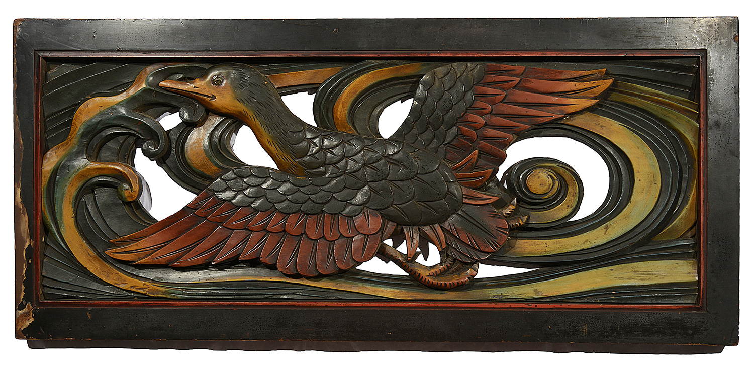 An early 20th century Chinese carved and polychrome decorated hanging panel