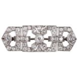 An Art Deco platinum and diamond set open plaque brooch,