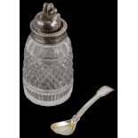 A George III silver mounted cut glass chutney pot and a fiddle and thread pattern condiment spoon
