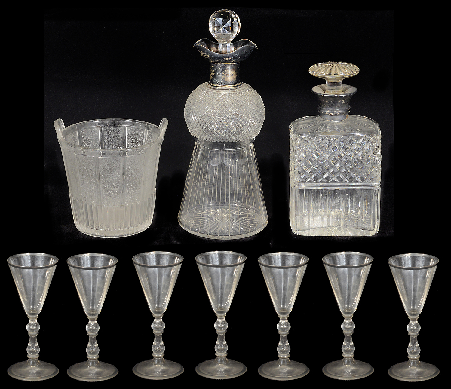 A late Victorian silver mounted thistle shaped decanter and other glass