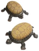 A pair of Victorian novelty ebonised tortoise footstools