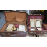 TWO SMALL VINTAGE CASES CONTAINING PHOTO FRAMES