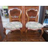 PAIR OF 19th CENTURY CARVED FLORAL DECORATED CROWN BACK DINING CHAIRS