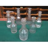 THREE PAIRS OF EARLY GLASS DECANTERS AND ONE OTHER GLASS DECANTER.
