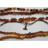 THREE STRANDS OF AMBER BEADS