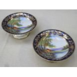 PAIR OF NORITAKE HANDPAINTED AND GILDED STEMMED CAKE STANDS,
