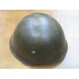 ITALIAN COMBAT HELMET, POSSIBLY WORLD WAR TWO.