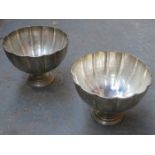 PAIR OF SILVER PLATED SCALLOP EDGED PUNCH BOWLS ON STEMMED SUPPORTS