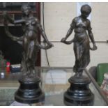 PAIR OF BRONZED METAL ART NOUVEAU STYLE FIGURES ON EBONISED STANDS