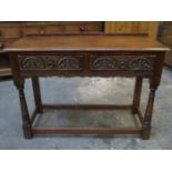 CARVED FRONTED OAK TWO DRAWER HALL TABLE BY WOOD BROS