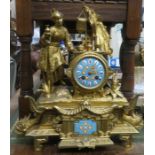 FRENCH GILT METAL FIGURE FORM MANTLE CLOCK WITH ENAMELLED DIAL DEPICTING A CHINESE FIGURE
