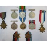 TWO WORLD WAR I STARS, SEVEN WORLD WAR II MEDALS AND UN PEACE MEDAL.