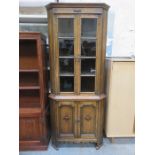 OAK TWO DOOR GLAZED CORNER DISPLAY CABINET WITH TWO CUPBOARD DOORS BELOW