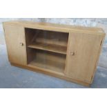 20th CENTURY LIGHT OAK CUPBOARD FITTED WITH TWO DOORS AND TWO GLASS SLIDING DOORS TO CENTRE