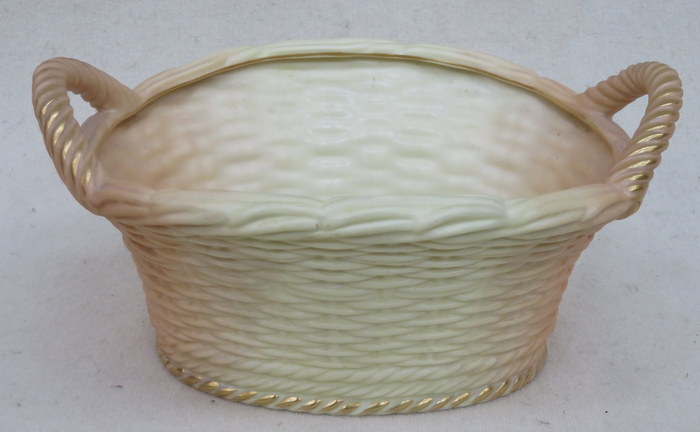 ROYAL WORCESTER BLUSH IVORY GILDED AND GLAZED CERAMIC TWO HANDLED BASKET, No 2365, DATED 1905,