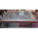 HEAVILY CARVED AND HANDPAINTED LARGE GLASS TOPPED COFFEE TABLE WITH METAL JALI INSERT
