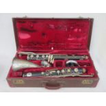 CASED VICTORIAN EBONY AND SILVER COLOURED SECTIONAL BASS CLARINET BY DUPRE,